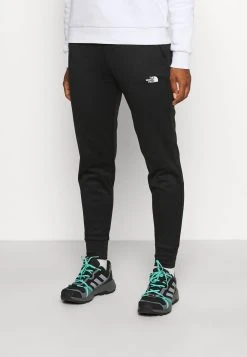 RĂ©duction The North Face CANYONLANDS JOGGER MEDIUM - Pantalon de survĂȘtement vĂȘtements randonnée female