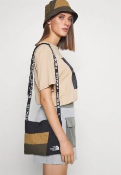 Prix Distinctifs The North Face RAEBURN X RENEWED SLING UNISEX - Sac bandoulière sacs compartiment pour téléphone portable